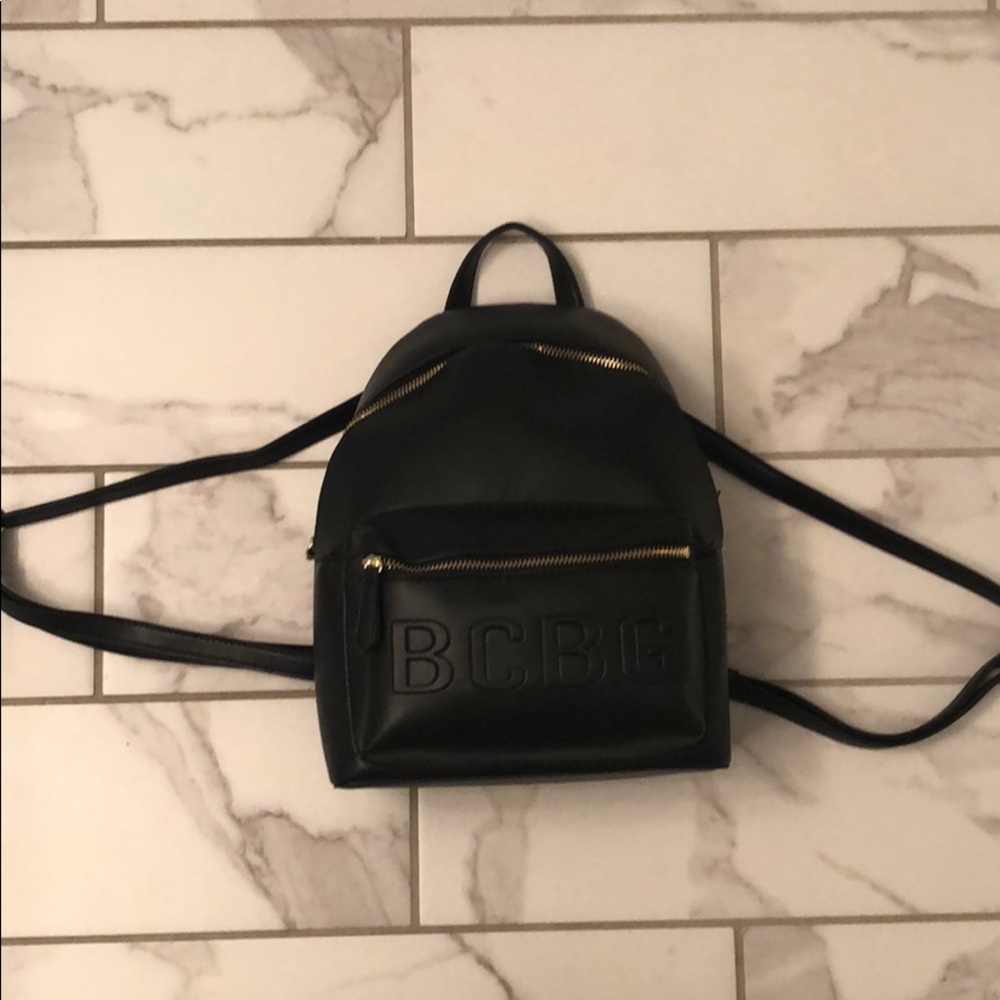 BLACK AND GOLD BCBG MINI BACKPACK